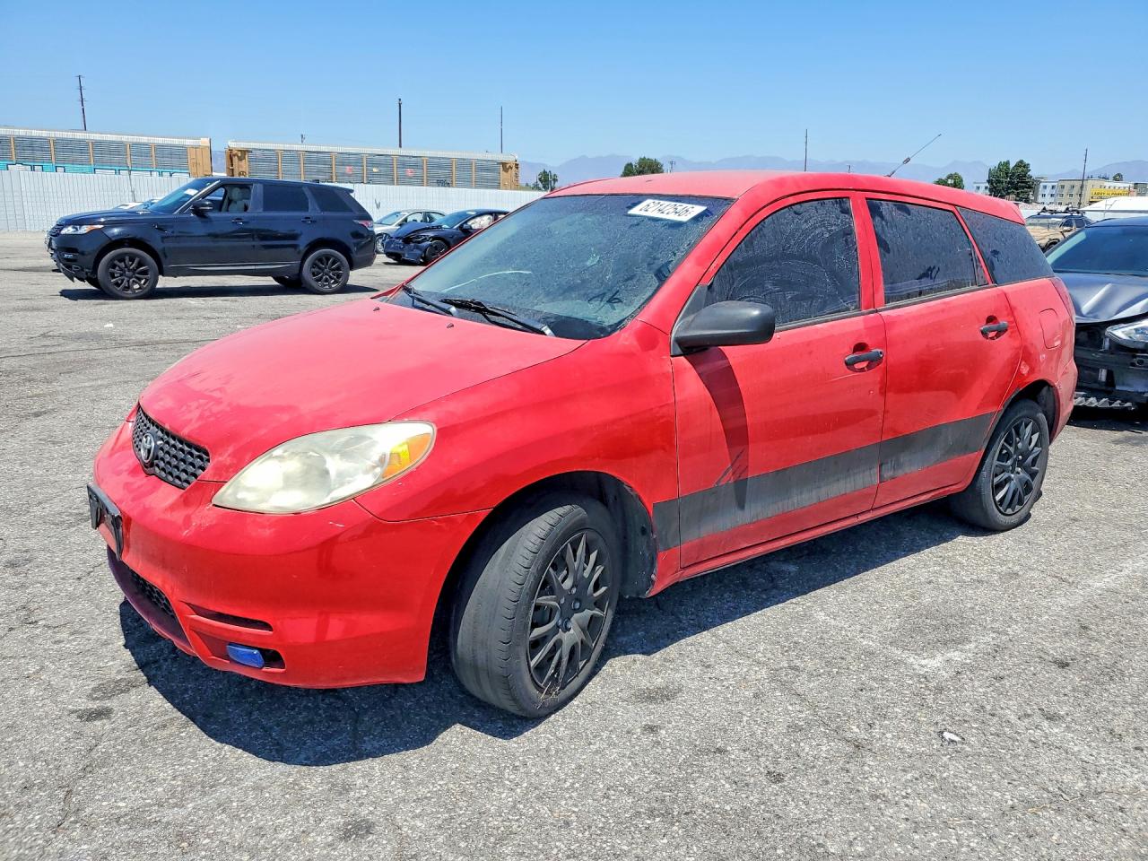 2003 Toyota Matrix XR, VIN 2T1KR32EX3C154637 — Side