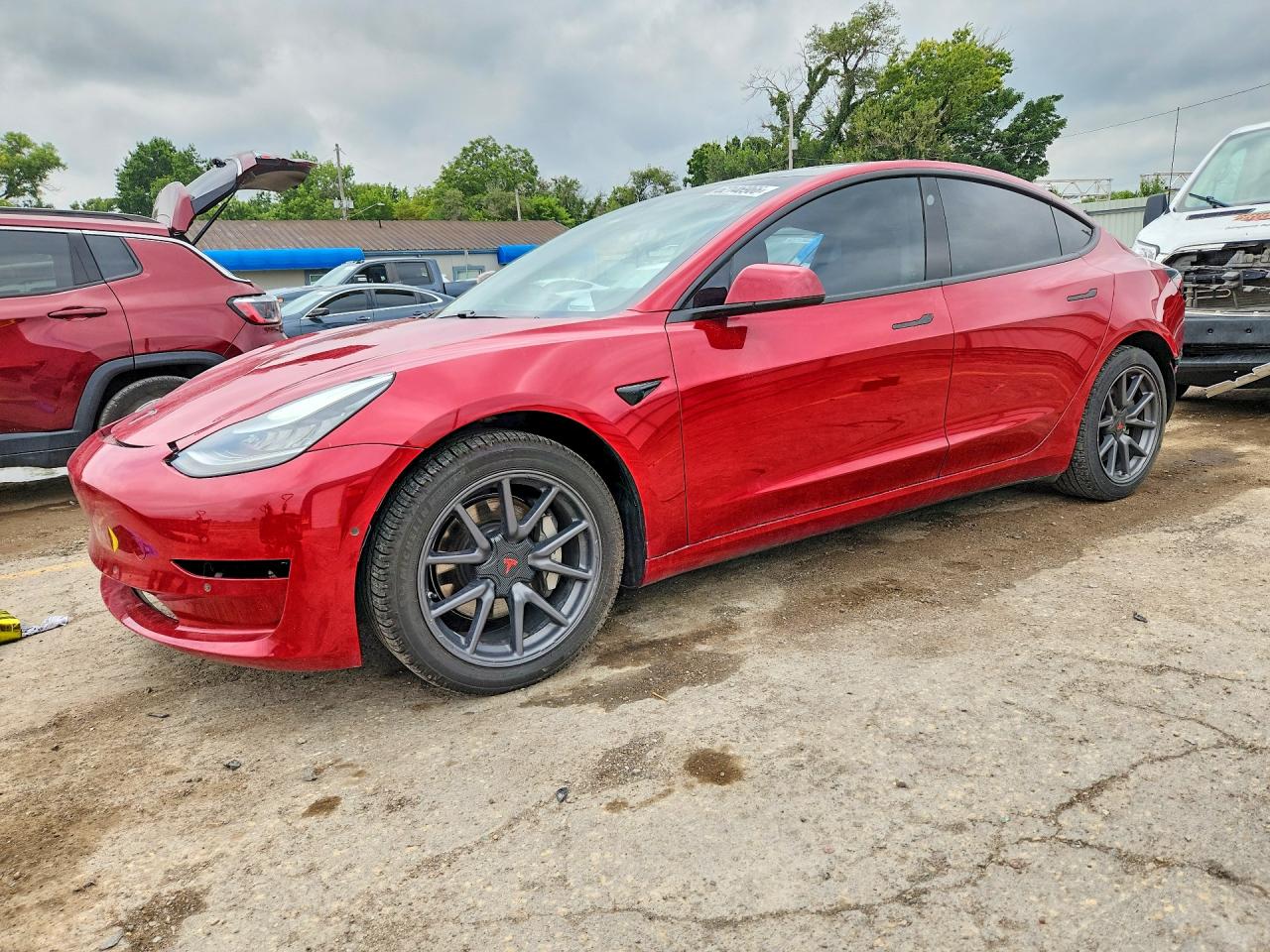 2020 Tesla Model 3 Performance, VIN 5YJ3E1EC1LF586477 — Side