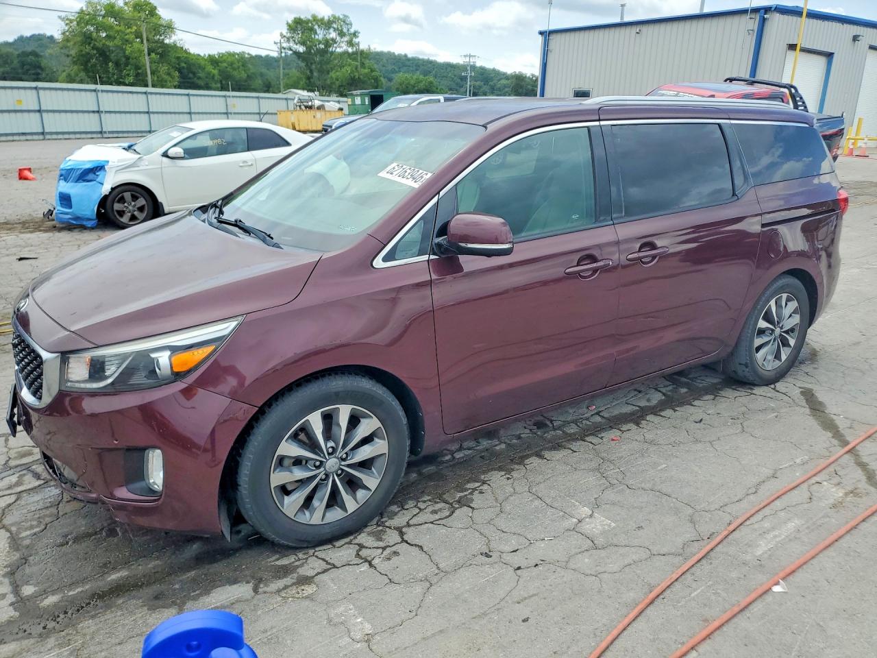 2016 Kia Sedona SX, VIN KNDMC5C14G6180939 — Side