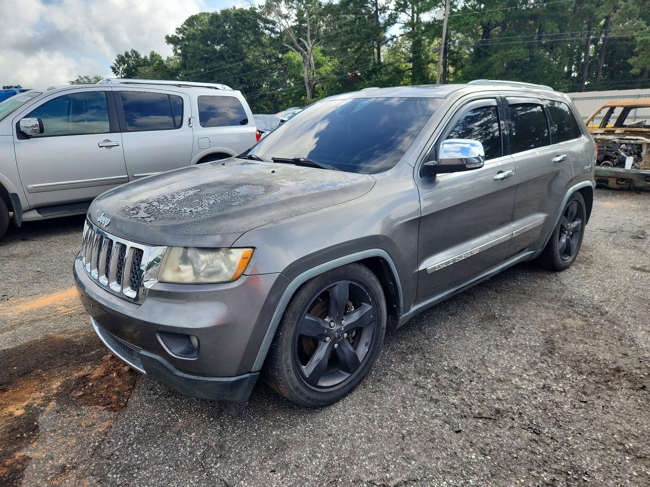 2011 Jeep Grand Cherokee Overland Summit, VIN 1J4RR6GT9BC583924 — Burn