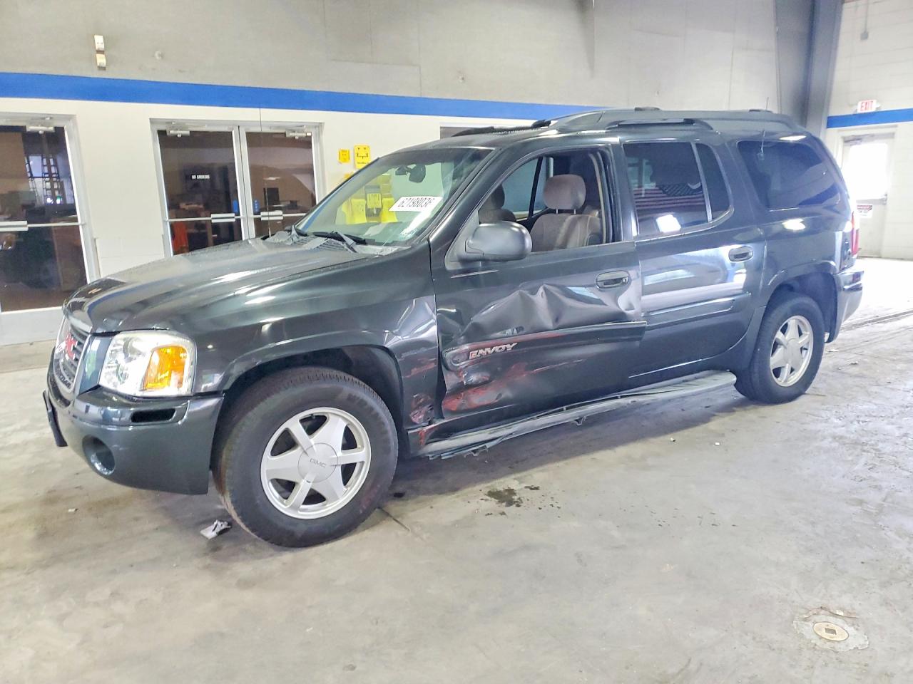 2003 GMC Envoy SLT, VIN 1GKET16S836134644 — Side