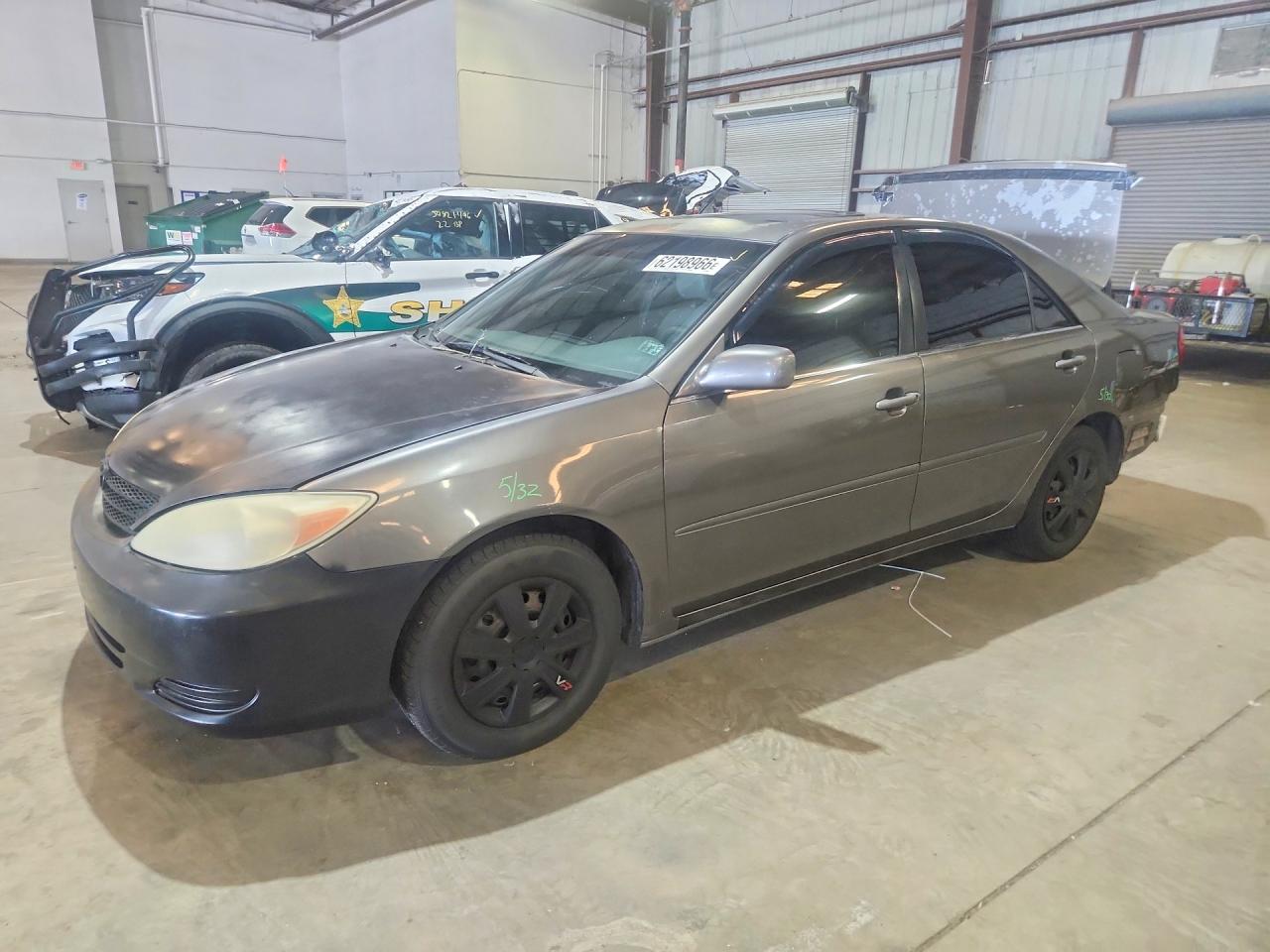 2003 Toyota Camry LE, VIN 4T1BE30K43U660564 — Rear end