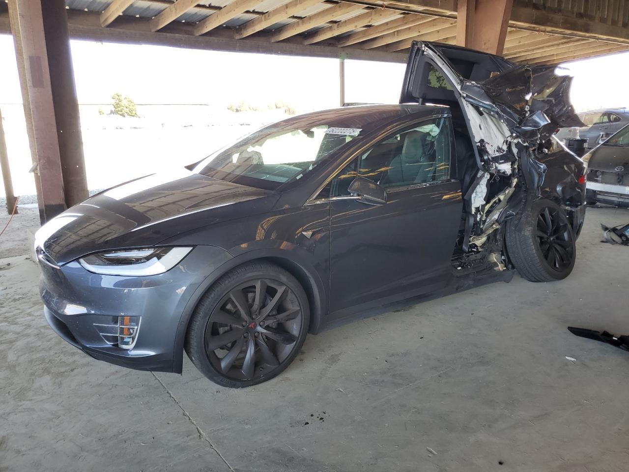2019 Tesla Model X 75D, VIN 5YJXCBE23KF207174 — Side
