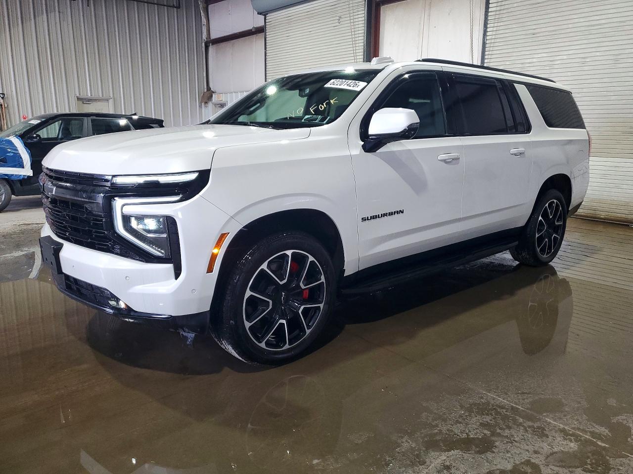 2025 Chevrolet Suburban RST, VIN 1GNS6ERLXSR271347 — Water / flood