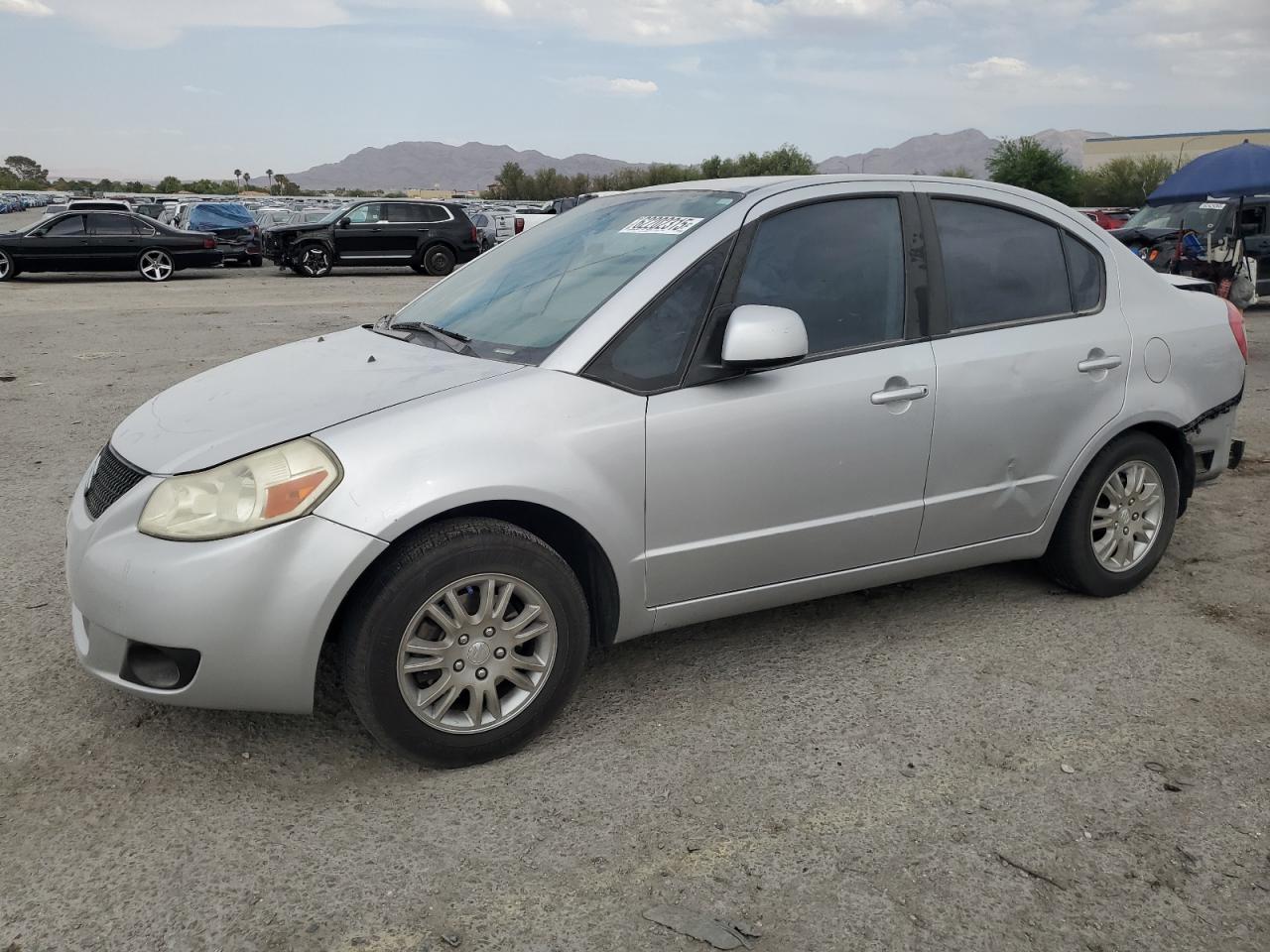 2013 Suzuki SX4 LE, VIN JS2YC5A35D6101897 — Rear end