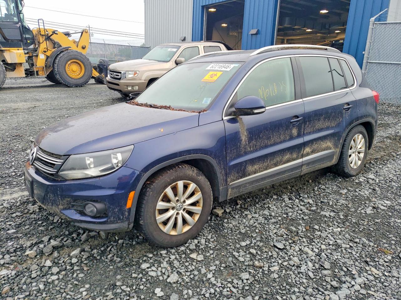 2014 Volkswagen Tiguan Trendline, VIN WVGJV3AXXEW624990 — Water / flood
