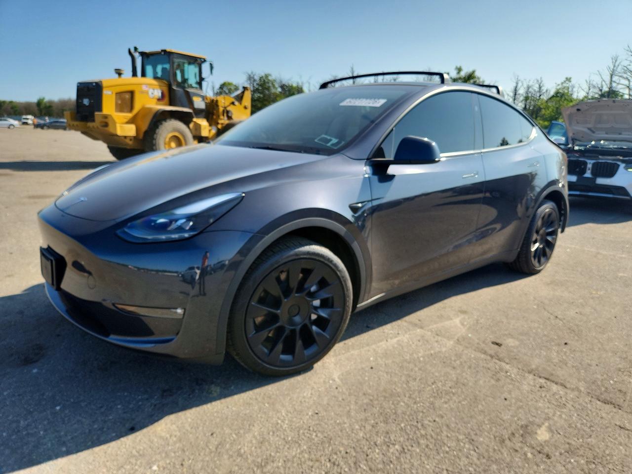 2024 Tesla Model Y Long Range, VIN 7SAYGDEE3RF163818 — Rear end
