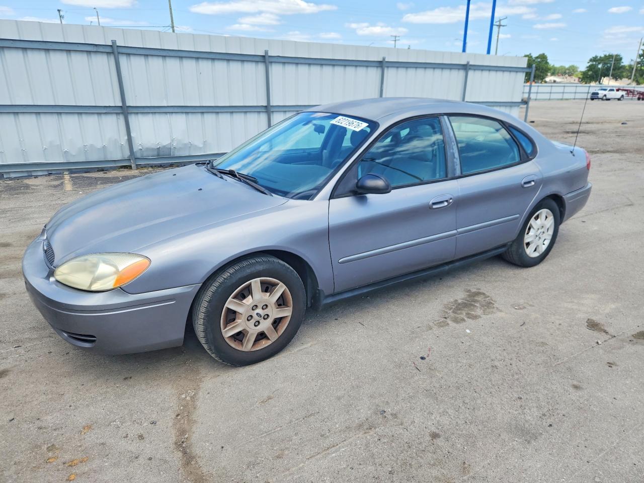 2006 Ford Taurus SE, VIN 1FAFP53U56A128454 — Side
