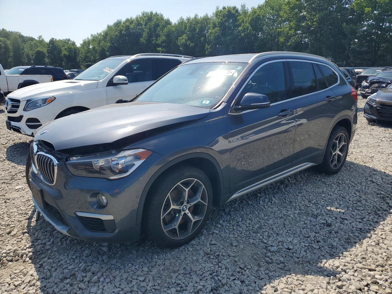 2018 BMW X1 xDrive28i, VIN WBXHT3Z36J4A65959 — Front end