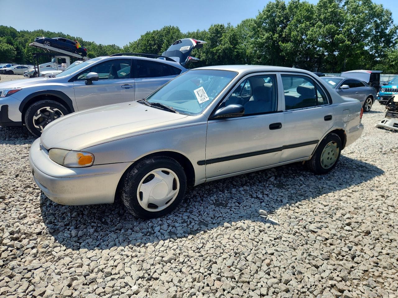 1999 Chevrolet Prizm Lsi, VIN 1Y1SK5286XZ448389 — Minor dents and scratches