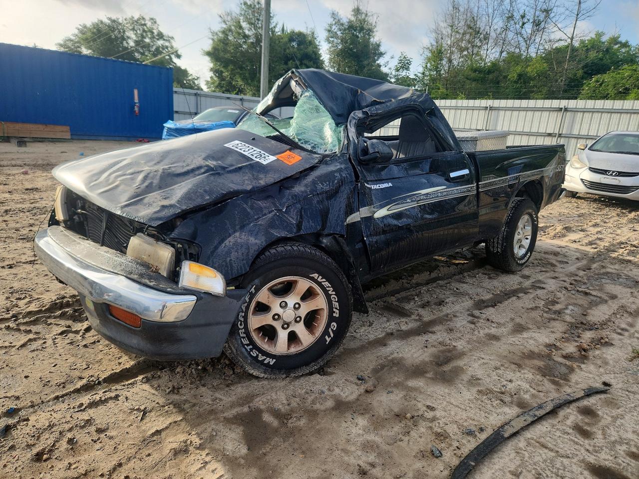 1999 Toyota Tacoma, VIN 4TANL42N2XZ523499 — Rollover