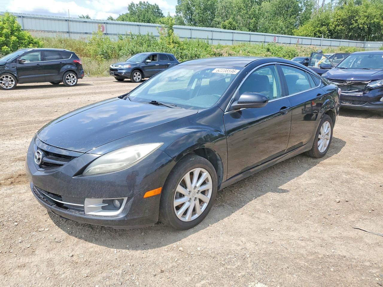 2011 Mazda 6 i Grand Touring, VIN 1YVHZ8CH6B5M06289 — Side