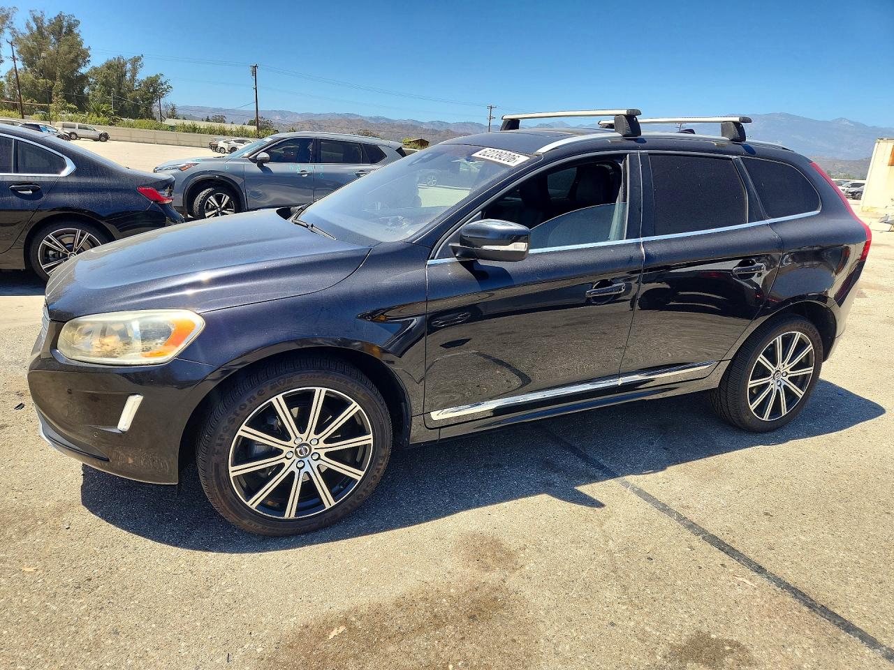 2015 Volvo XC60 T6, VIN YV4902RK1F2731506 — Side