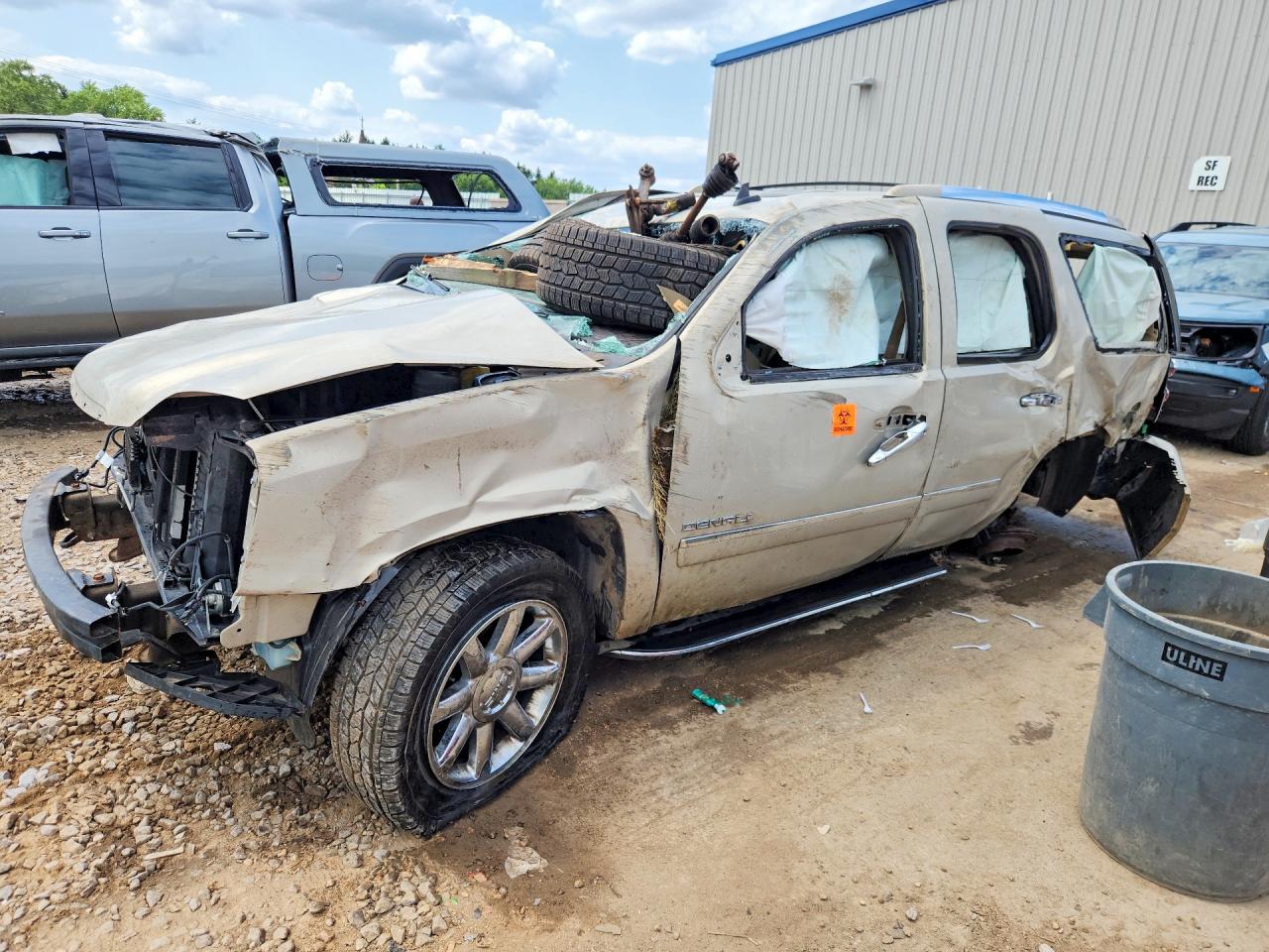 2010 GMC Yukon Denali, VIN 1GKUKEEF7AR104704 — Rollover