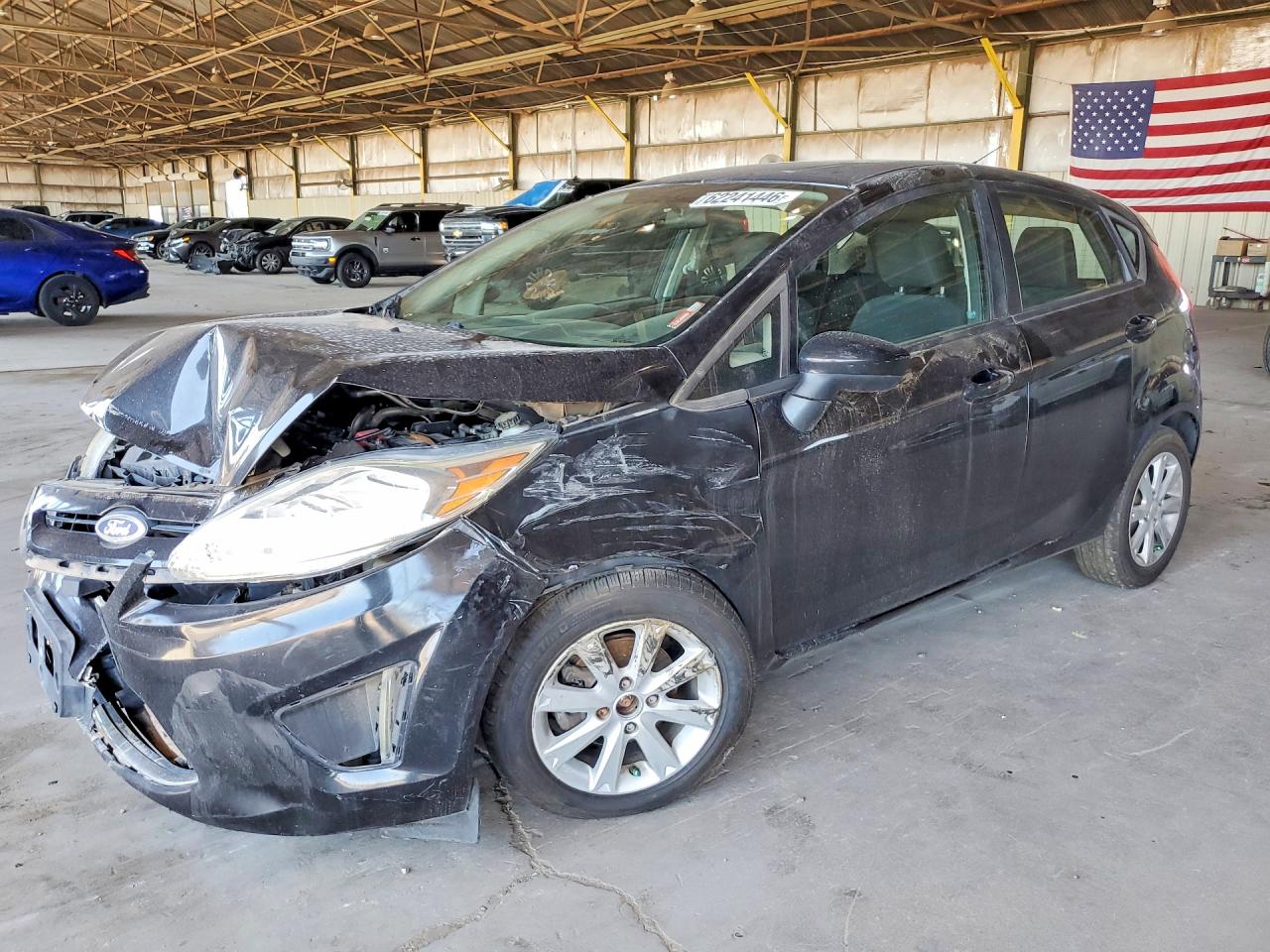 2011 Ford Fiesta SE, VIN 3FADP4EJ7BM134063 — Front end