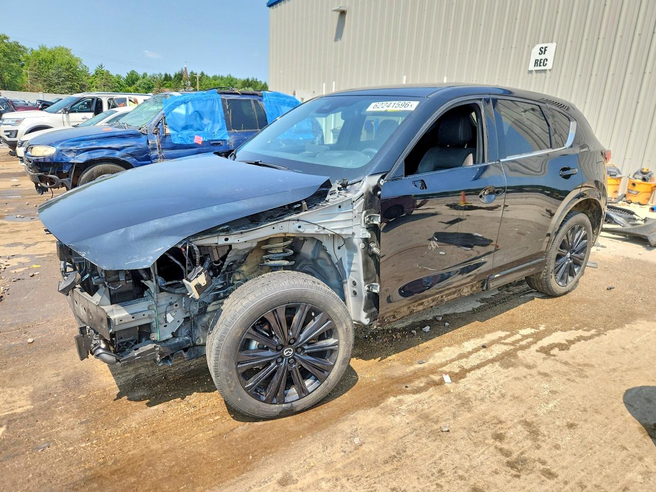 2025 Mazda CX-5 Premium, VIN JM3KFBDY8S0571183 — Front end