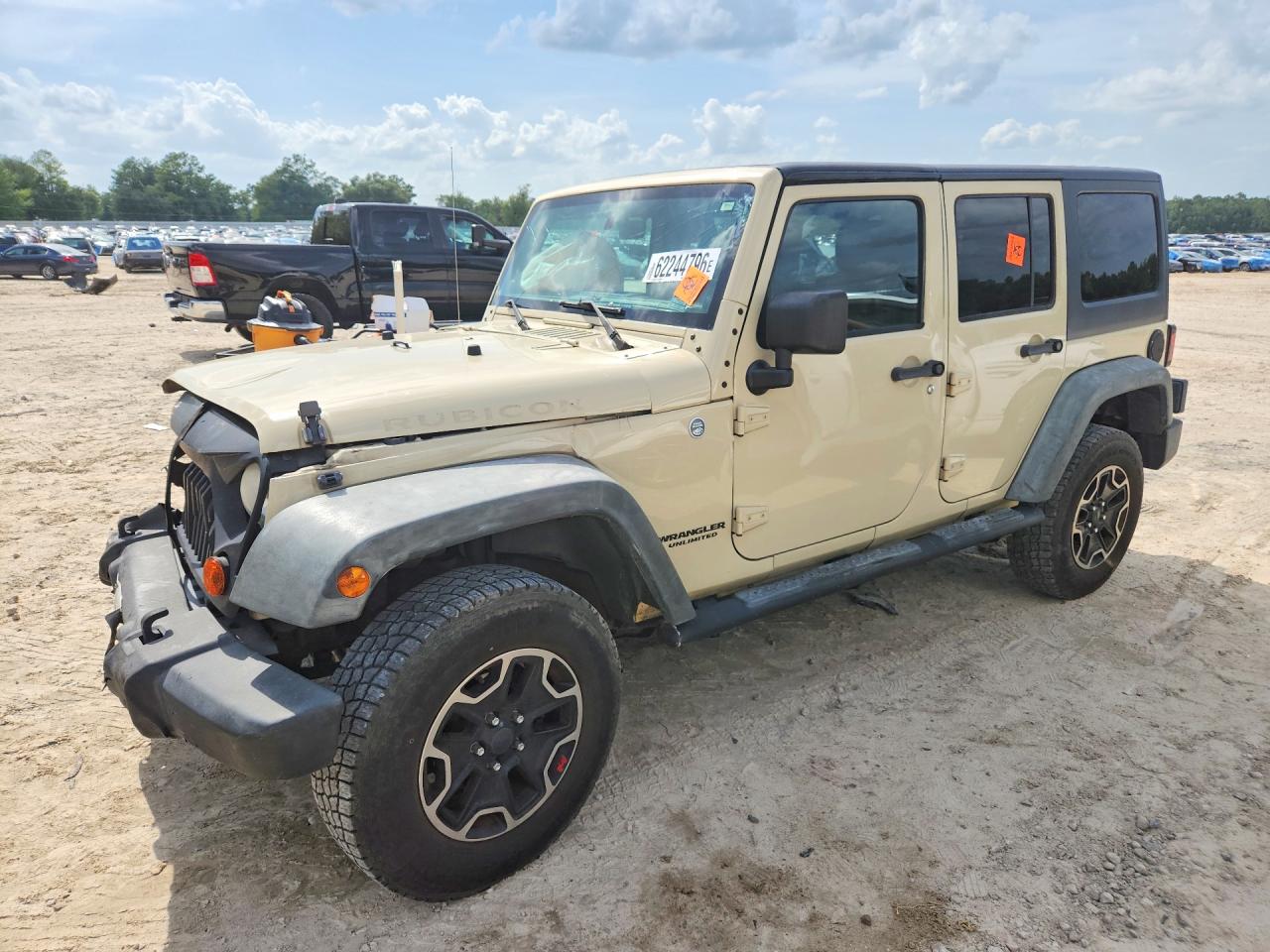 2011 Jeep Wrangler Unlimited Rubicon, VIN 1J4BA6H12BL615134 — Перед