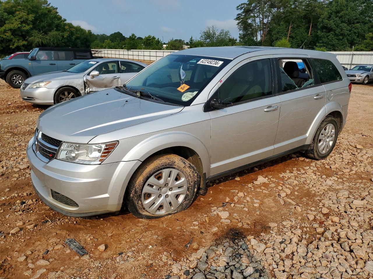 2014 Dodge Journey American Value, VIN 3C4PDCAB5ET100898 — Vandalism