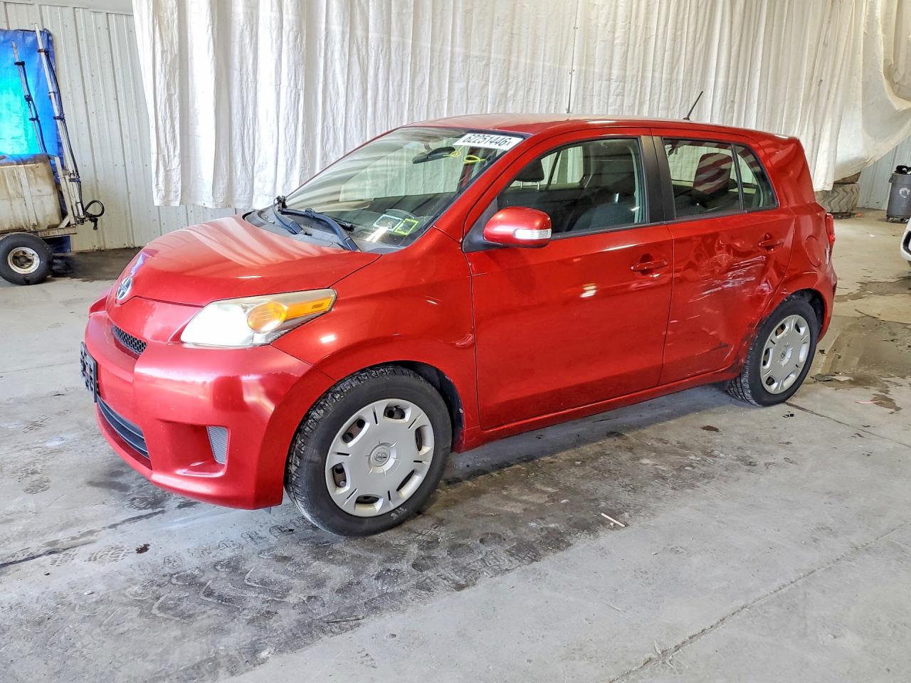 2014 Scion xD, VIN JTKKUPB43E1040007 — Side