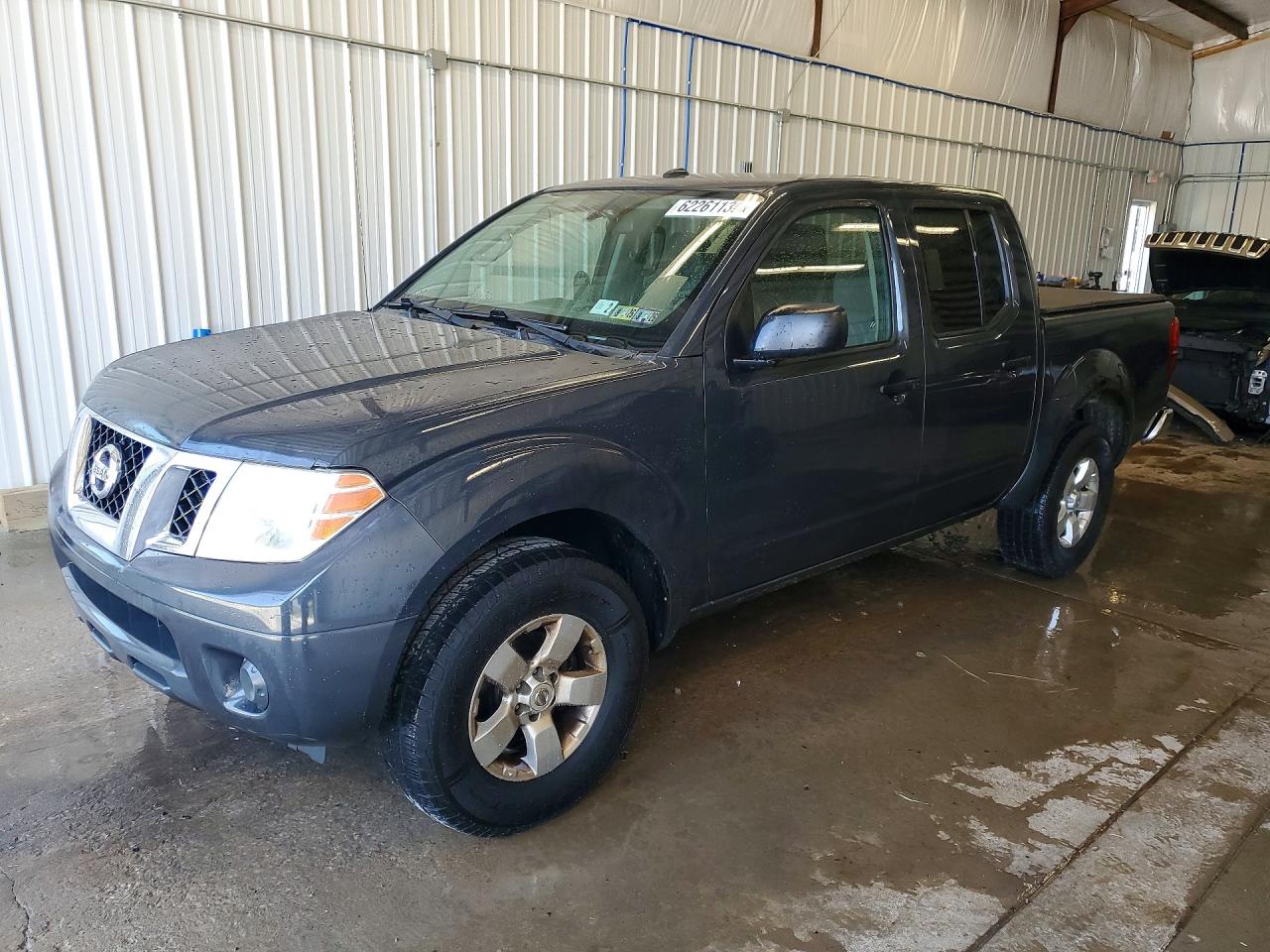 2013 Nissan Frontier Pro-4X, VIN 1N6AD0EV4DN721344 — Side