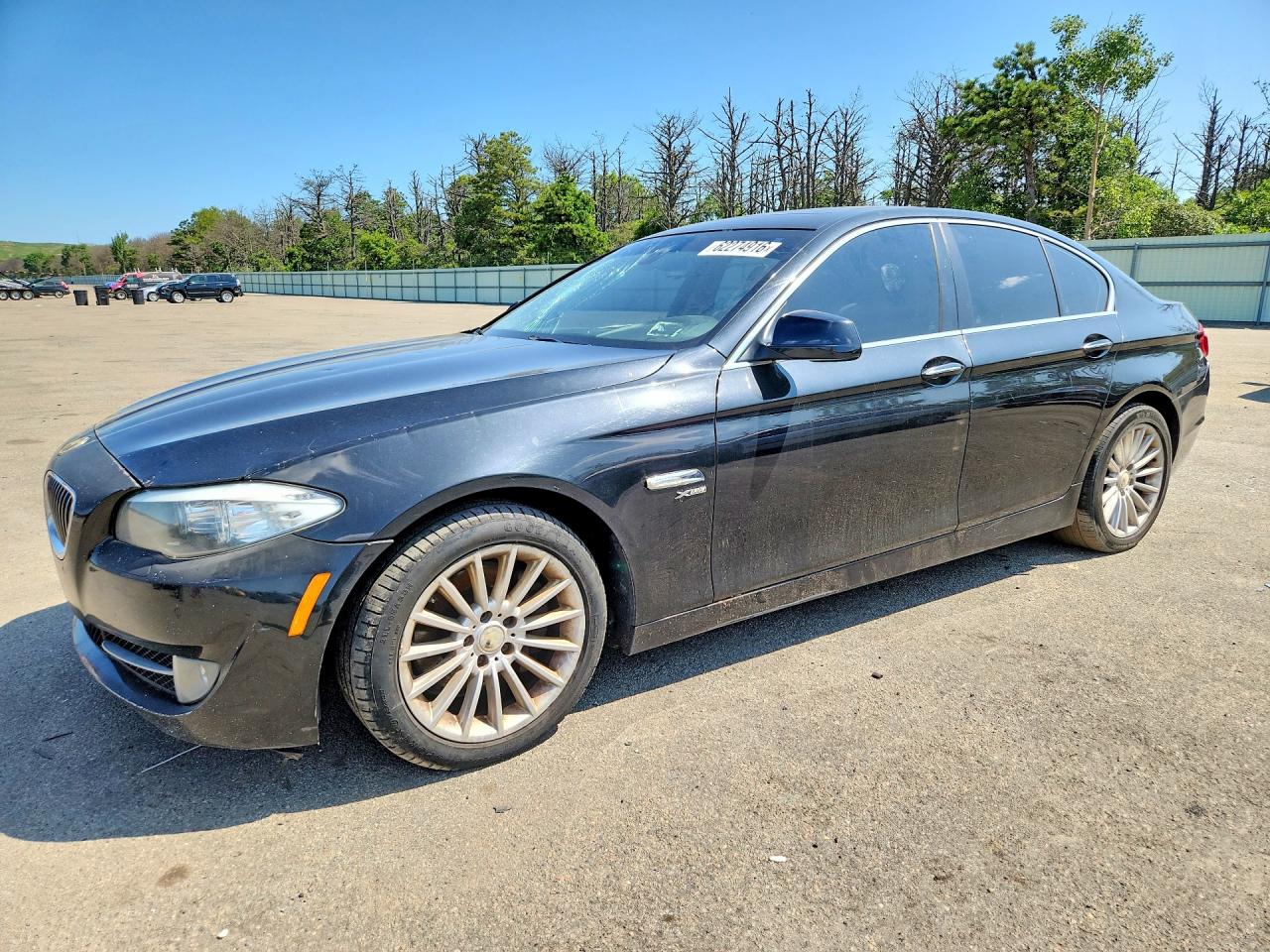 2011 BMW 5 Series 535i xDrive, VIN WBAFU7C51BC779583 — Side