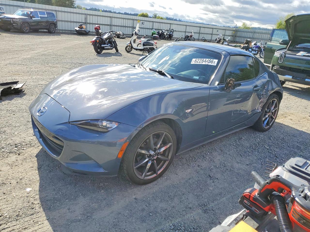 2021 Mazda MX-5 Miata Grand Touring, VIN JM1NDAM7XM0455614 — Side