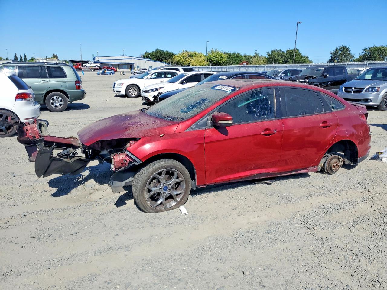 2014 Ford Focus SE, VIN 1FADP3F21EL323895 — Vandalism