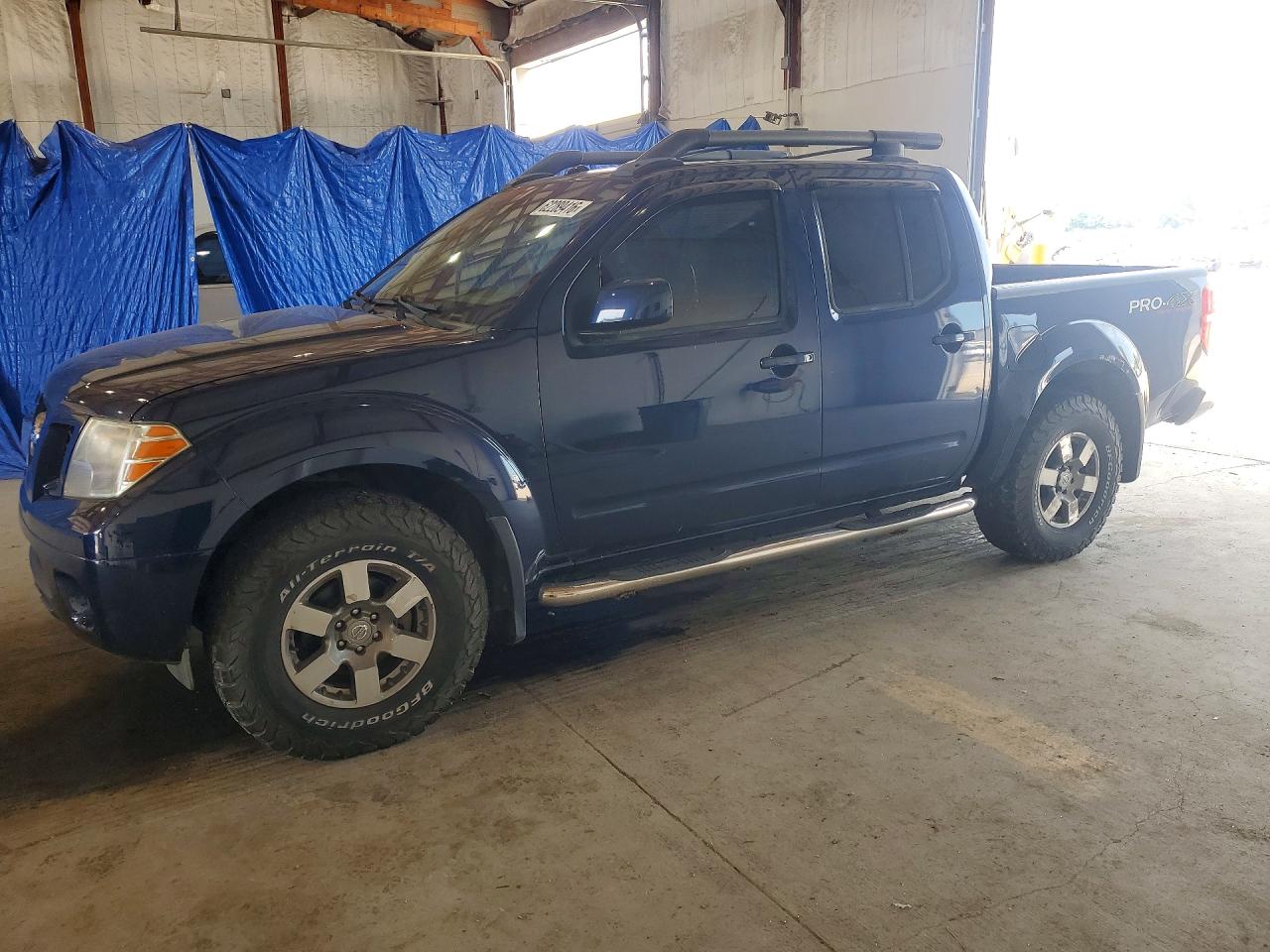 2011 Nissan Frontier Pro-4X, VIN 1N6AD0EV0BC424659 — Front end