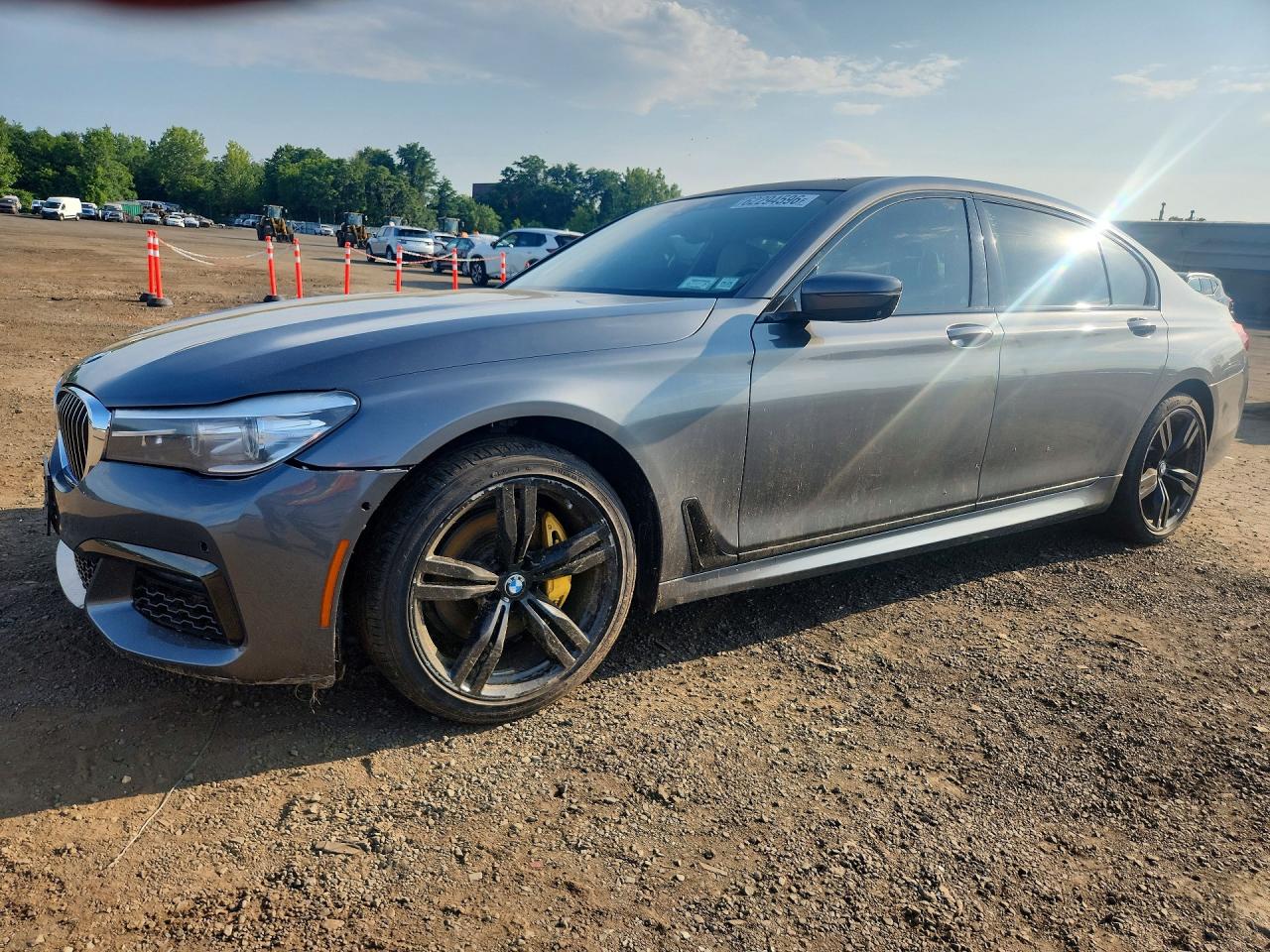 2017 BMW 7 Series 740i, VIN WBA7E2C58HG740107 — Зад
