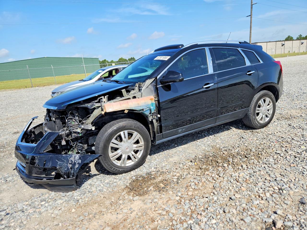 2014 Cadillac SRX Luxury Collection, VIN 3GYFNBE30ES579754 — Перед