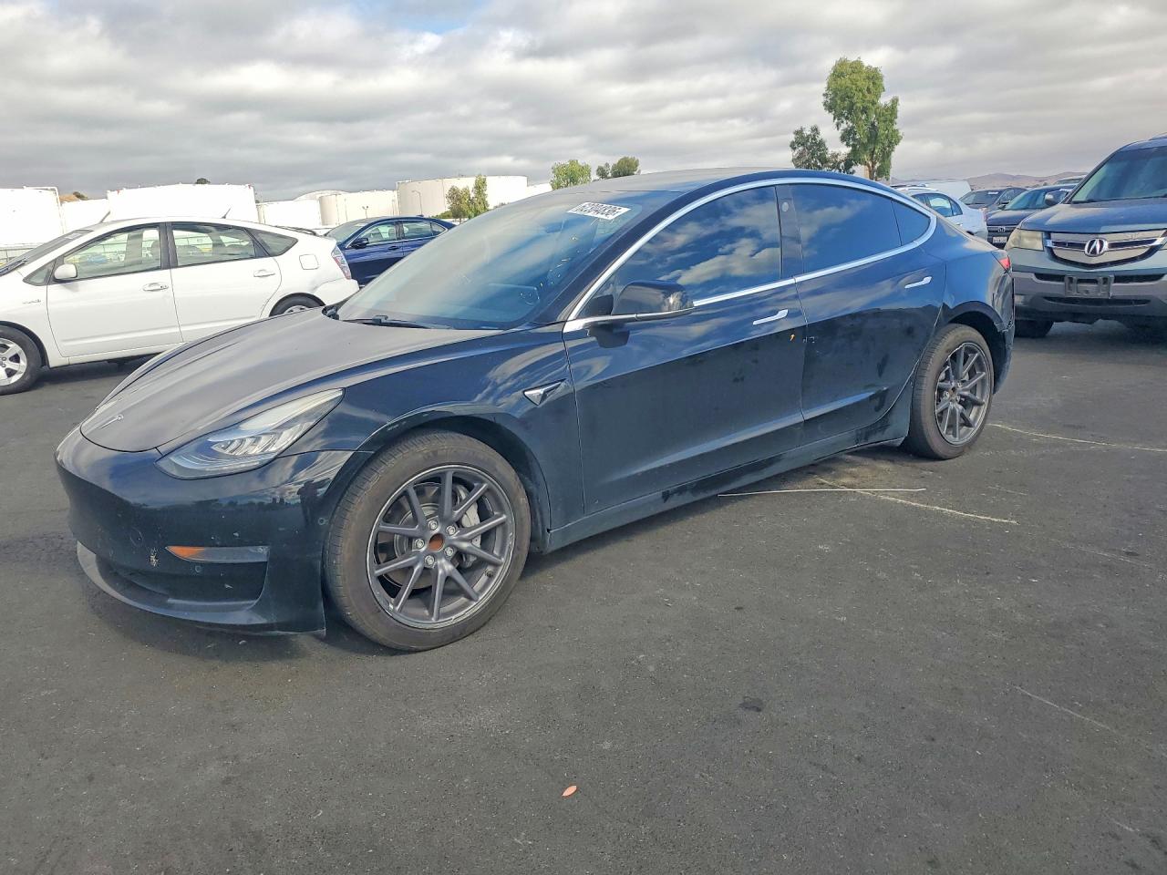 2019 Tesla Model 3 Mid Range, VIN 5YJ3E1EA9KF398416 — Side