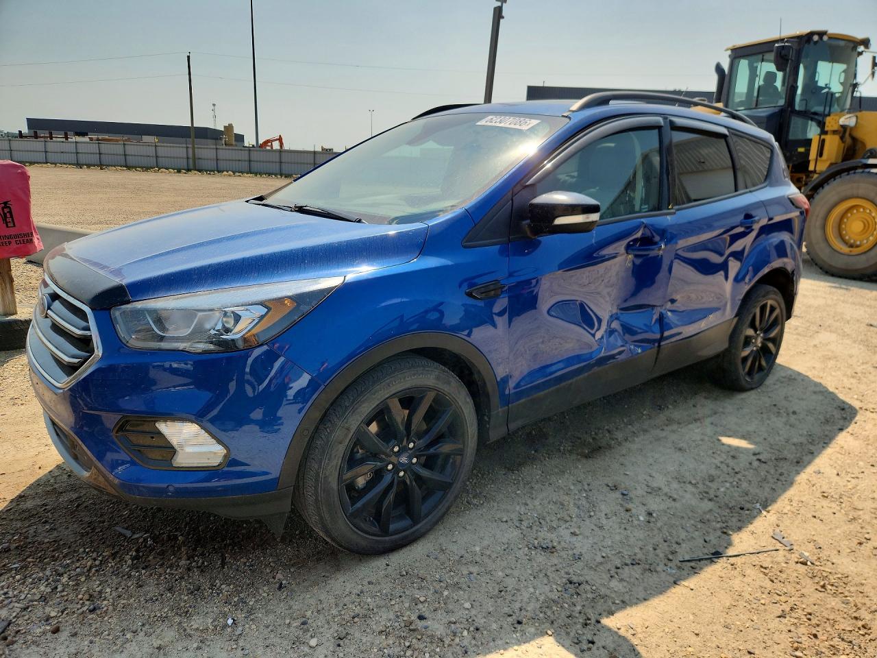 2019 Ford Escape Titanium, VIN 1FMCU9J9XKUB39272 — Side