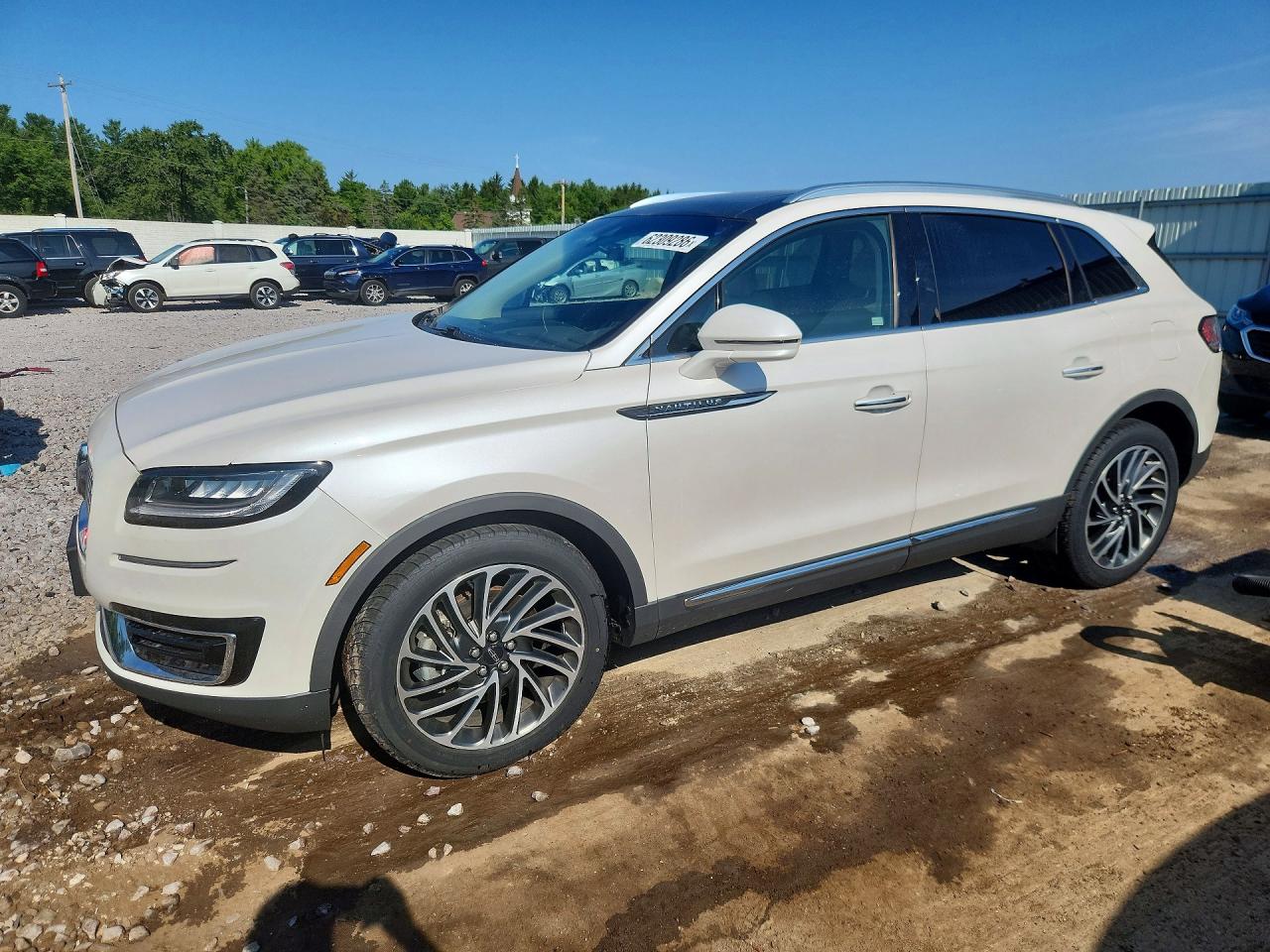 2019 Lincoln Nautilus Reserve, VIN 2LMPJ8L94KBL66713 — Minor dents and scratches