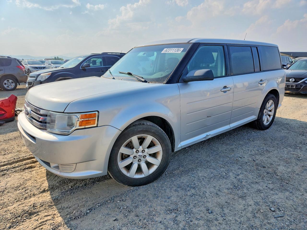 2009 Ford Flex SE, VIN 2FMDK51C19BA03305 — Side
