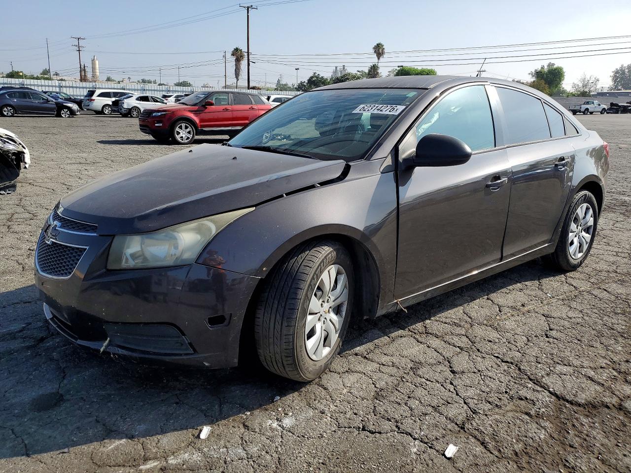 2014 Chevrolet Cruze LS, VIN 1G1PA5SHXE7308943 — Side