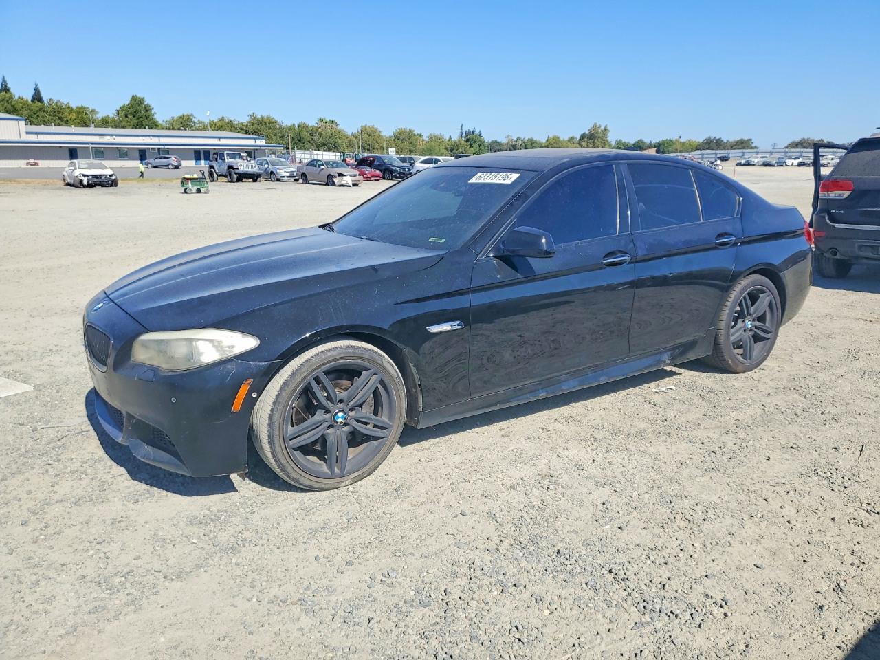 2011 BMW 5 Series 550i, VIN WBAFR9C52BC758383 — Minor dents and scratches