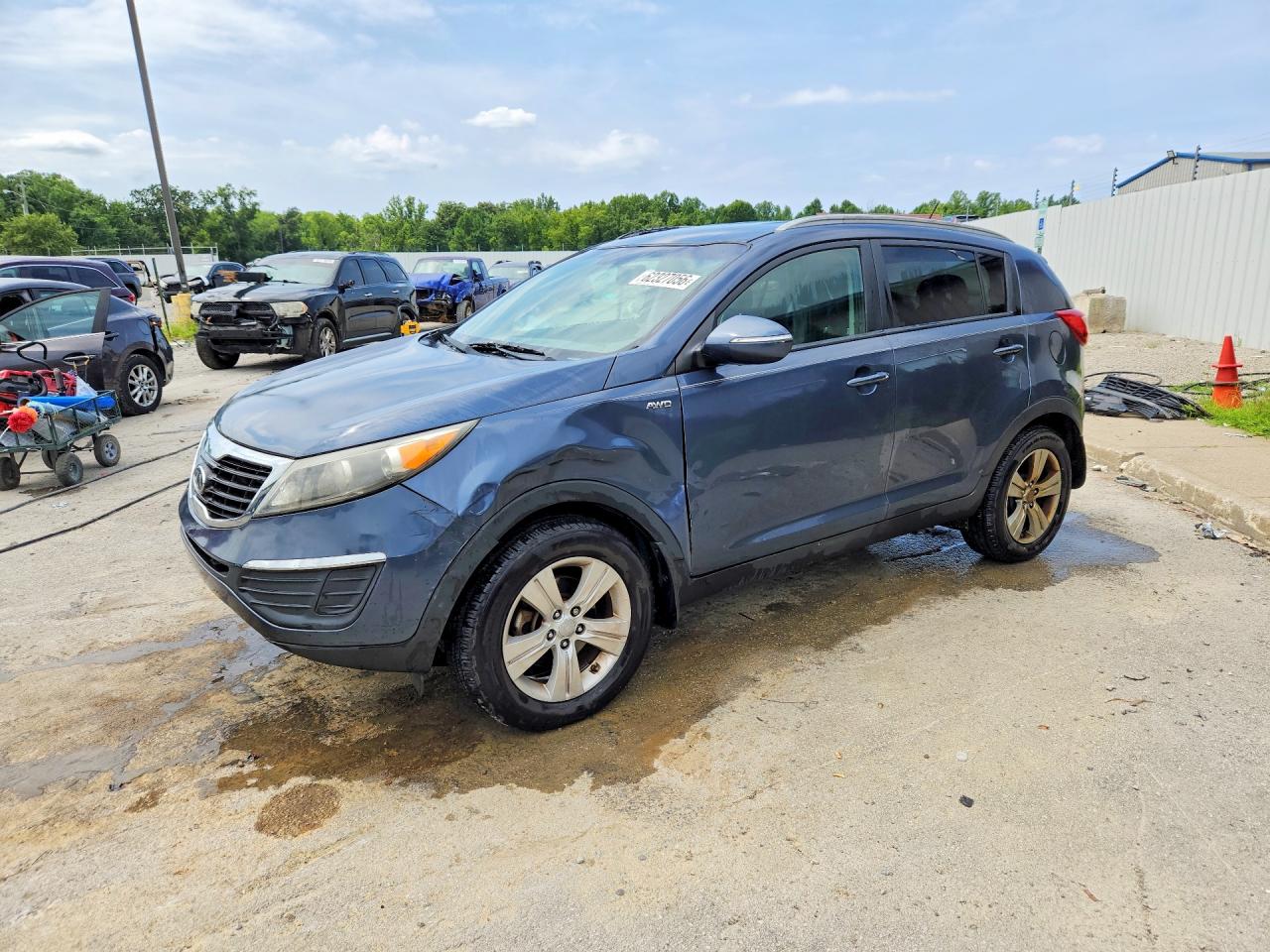 2012 Kia Sportage LX, VIN KNDPBCA24C7317608 — Side