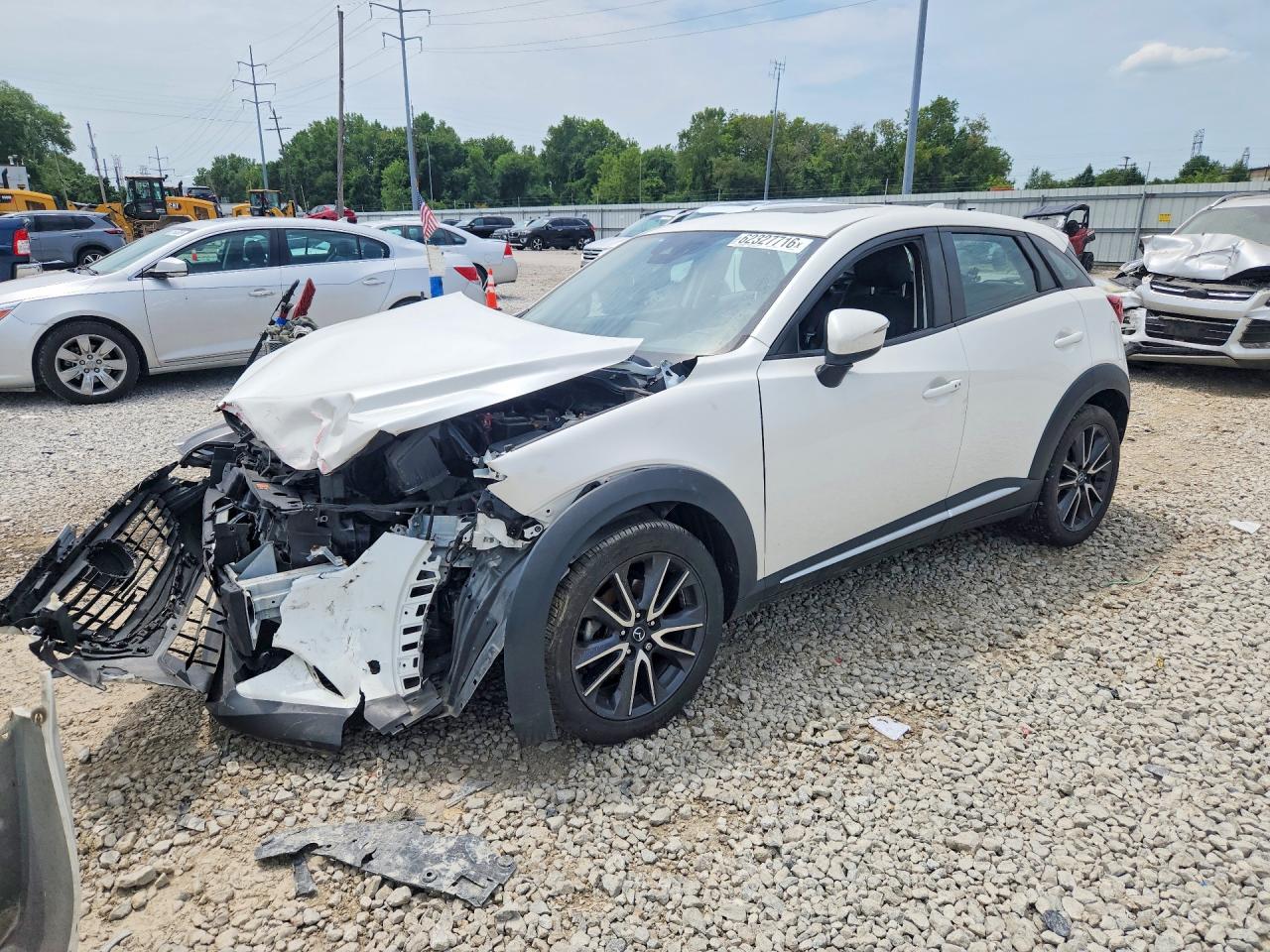 2018 Mazda CX-3 Grand Touring, VIN JM1DKFD75J0310622 — Front end