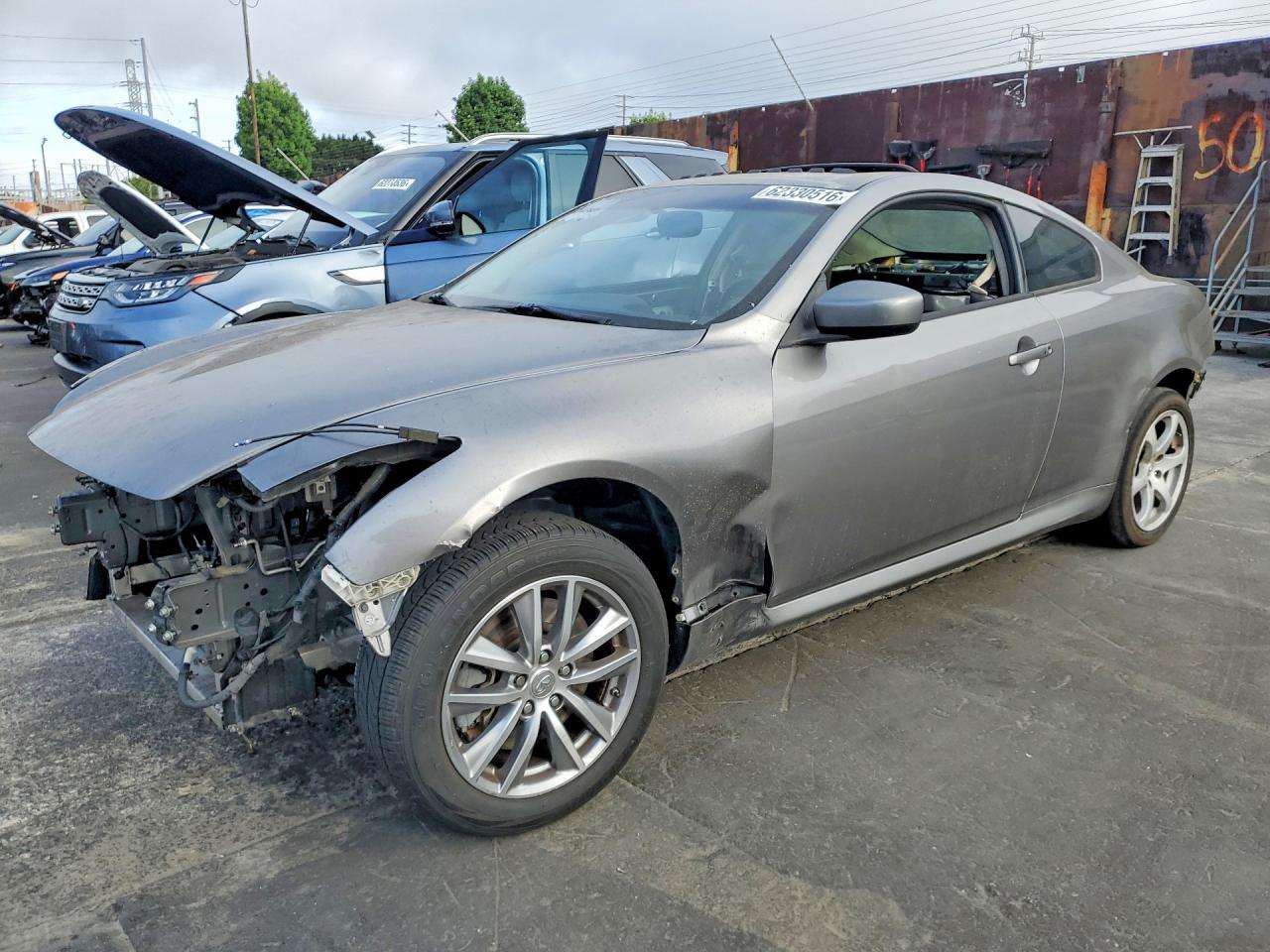 2014 Infiniti Q60 Journey, VIN JN1CV6EK2EM112958 — Vandalism