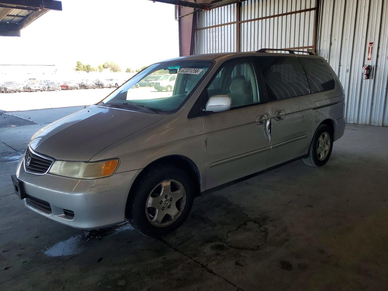 2001 Honda Odyssey EX, VIN 2HKRL18661H576919 — Side