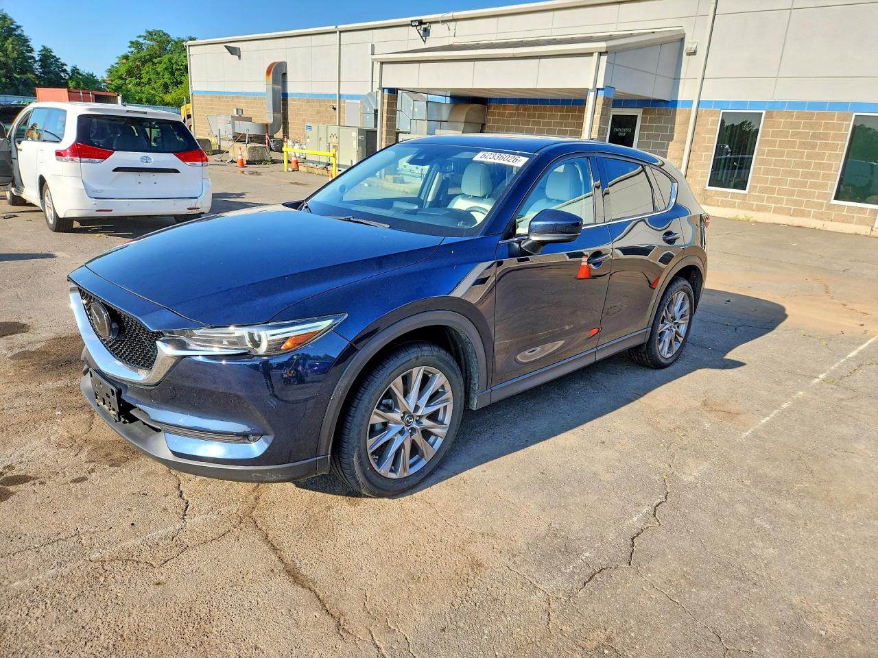 2019 Mazda CX-5 Grand Touring, VIN JM3KFBDM7K0582432 — Water / flood