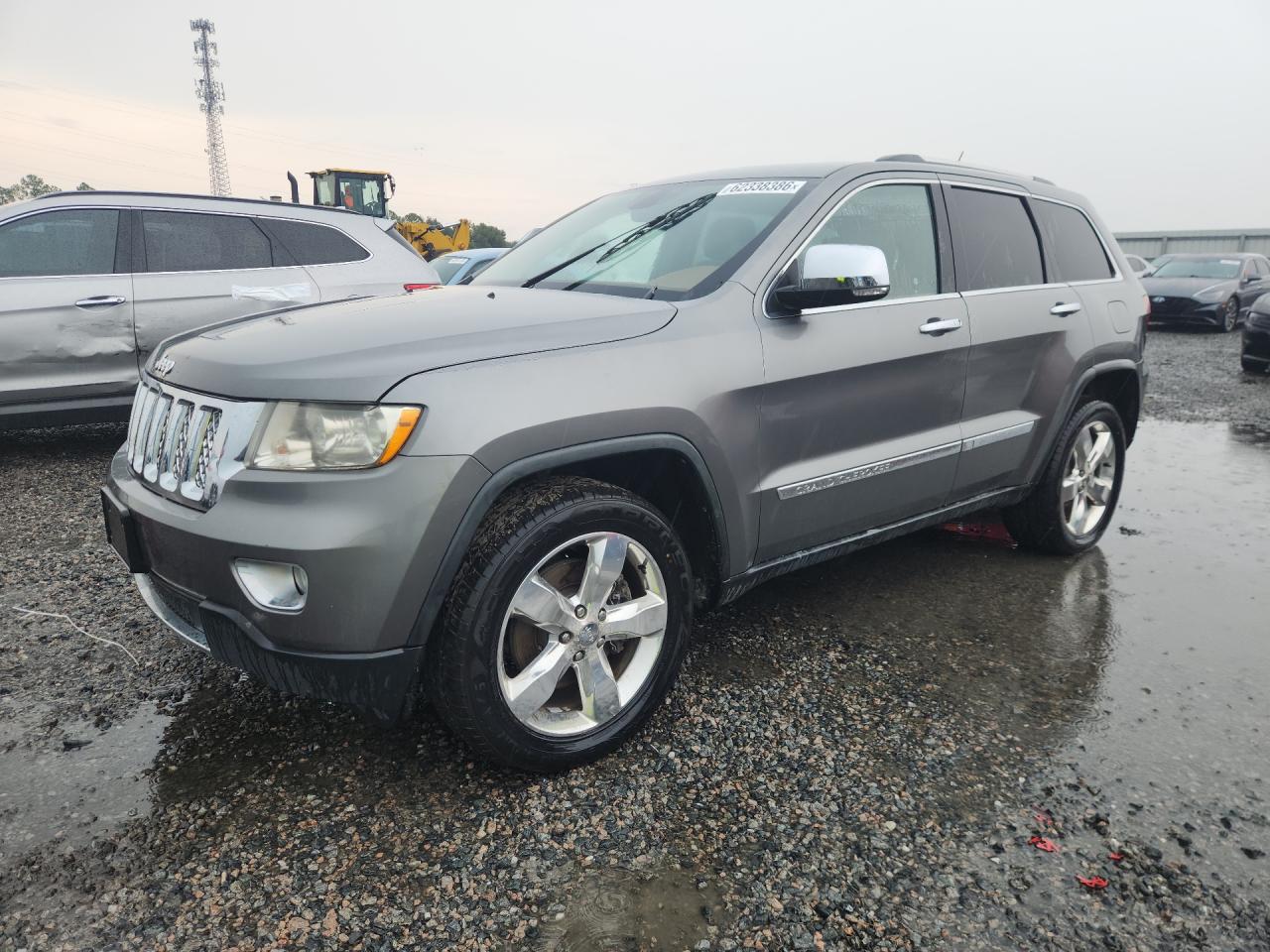 2012 Jeep Grand Cherokee Overland, VIN 1C4RJFCT5CC148810 — Minor dents and scratches