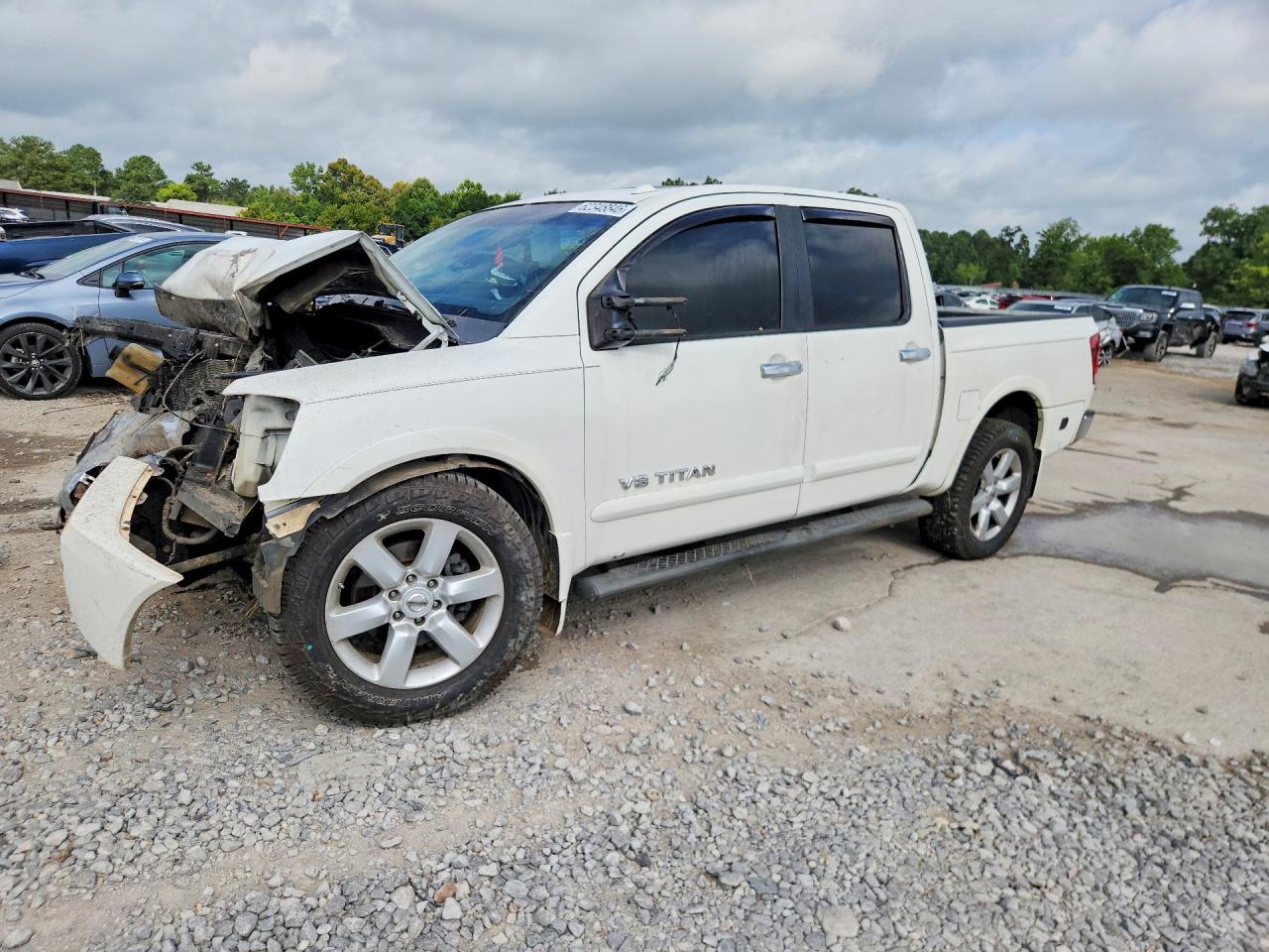 2010 Nissan Titan LE, VIN 1N6BA0EDXAN313723 — Front end