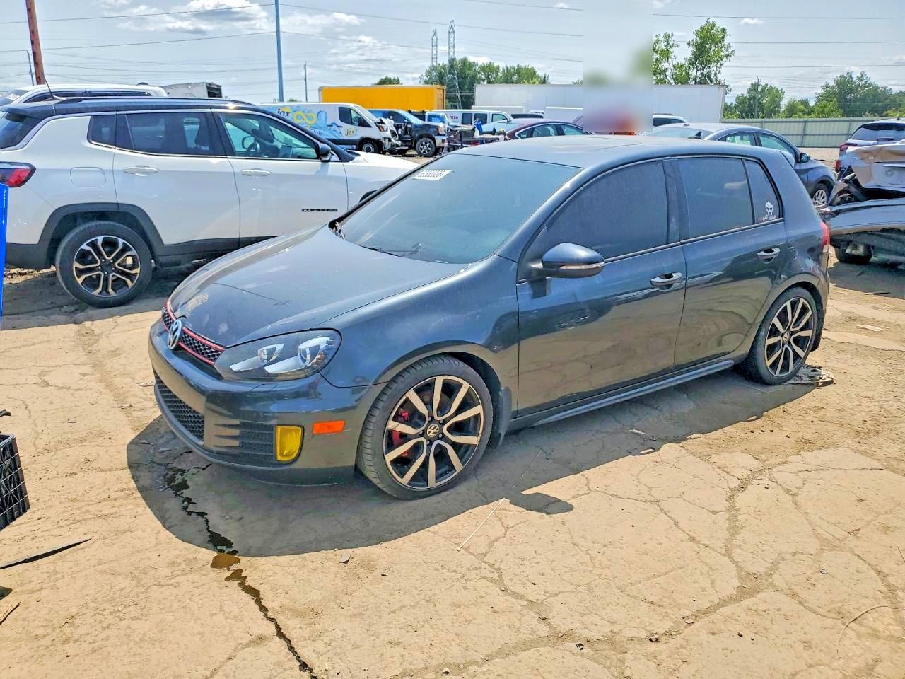 2014 Volkswagen Golf GTI Wolfsburg Edition, VIN WVWGD7AJ6EW010345 — Front end