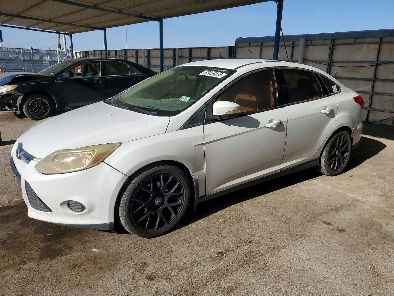 2016 Ford Focus SE, VIN 1FADP3F24GL230209 — Rear end