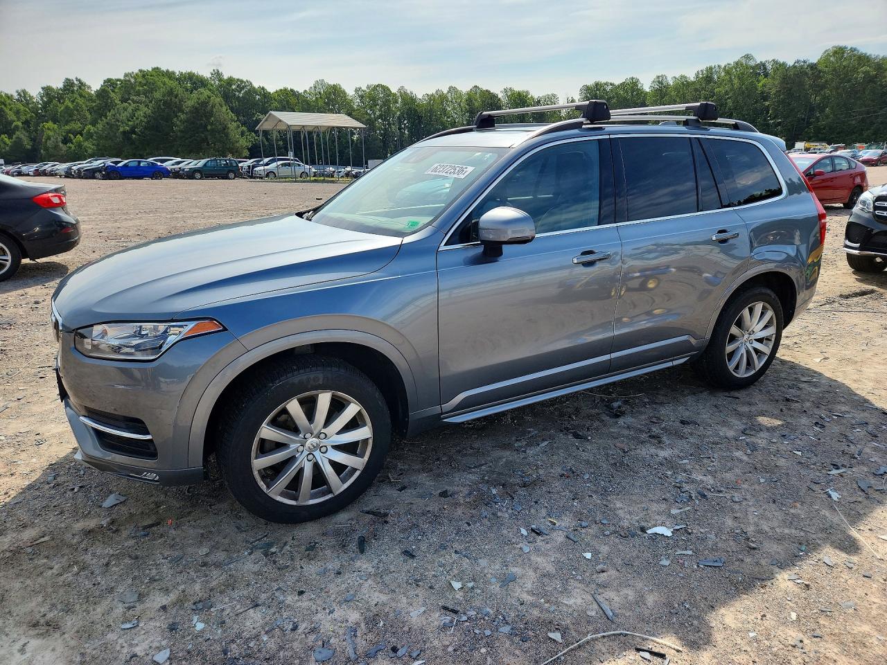 2016 Volvo XC90 T6 Momentum, VIN YV4A22PK2G1092179 — Бок