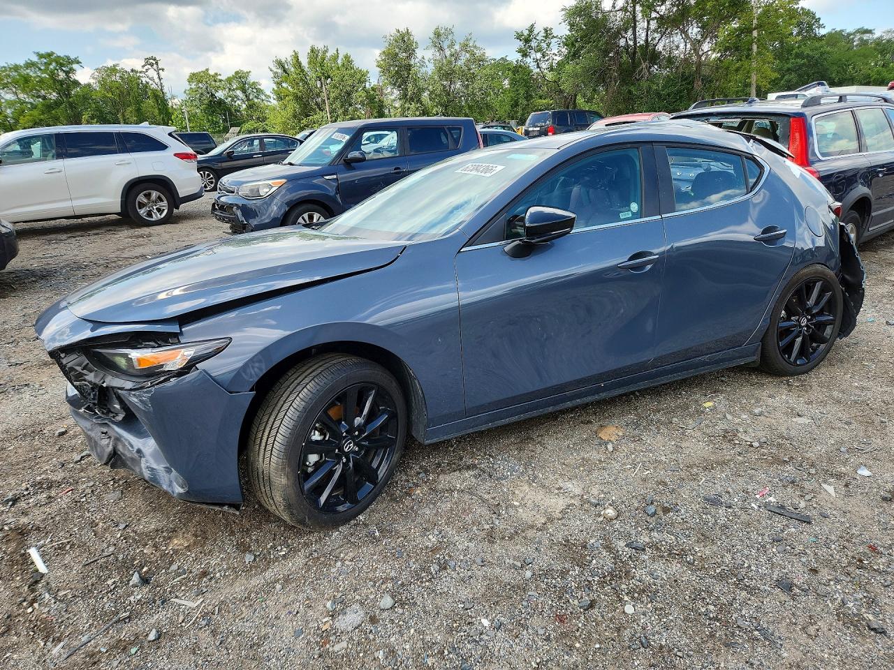 2026 Mazda 3 S Carbon Edition, VIN JM1BPBLL7T1854049 — Rear end