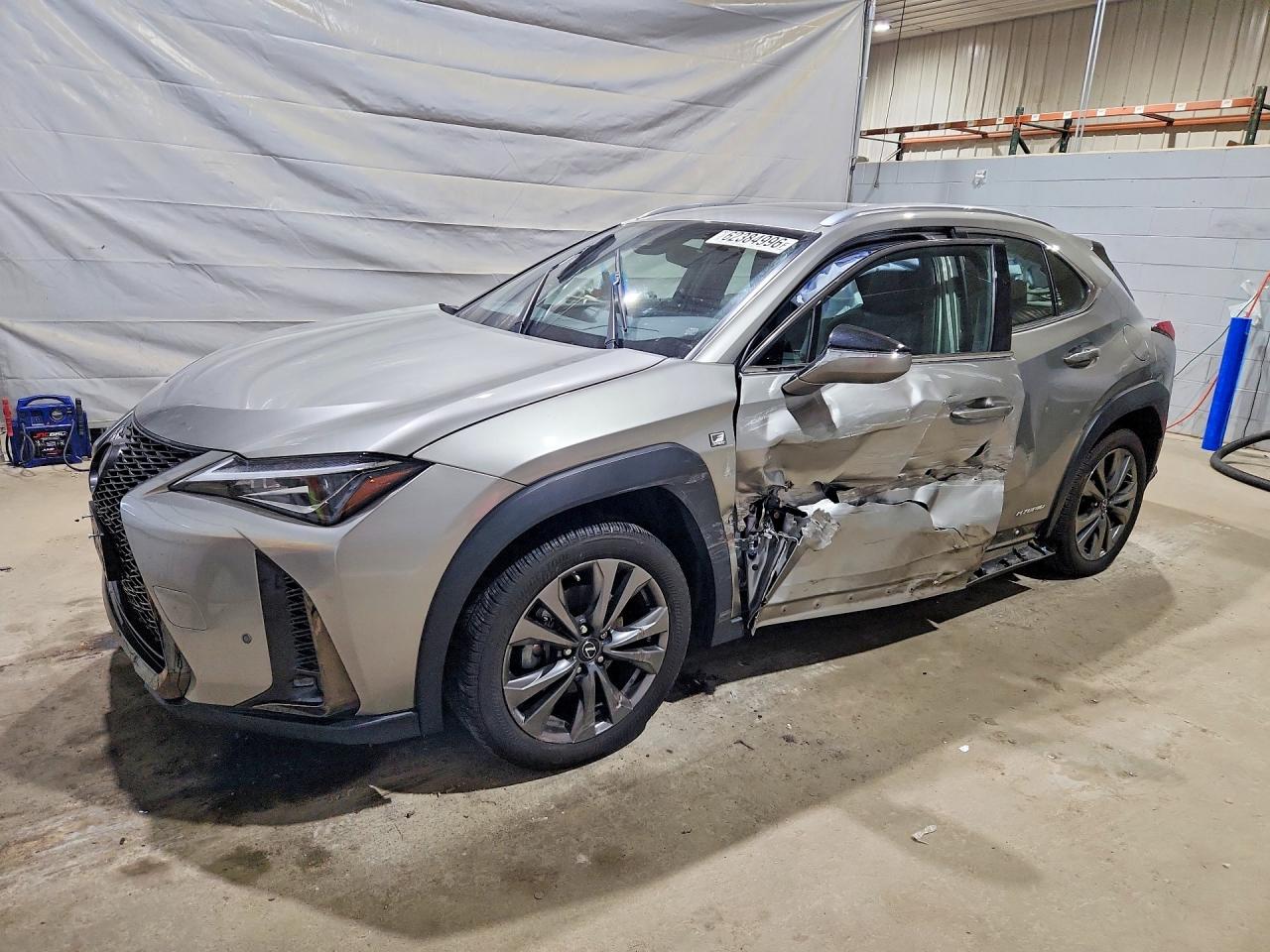 2021 Lexus UX 250h F Sport, VIN JTHR9JBH6M2051498 — Бок
