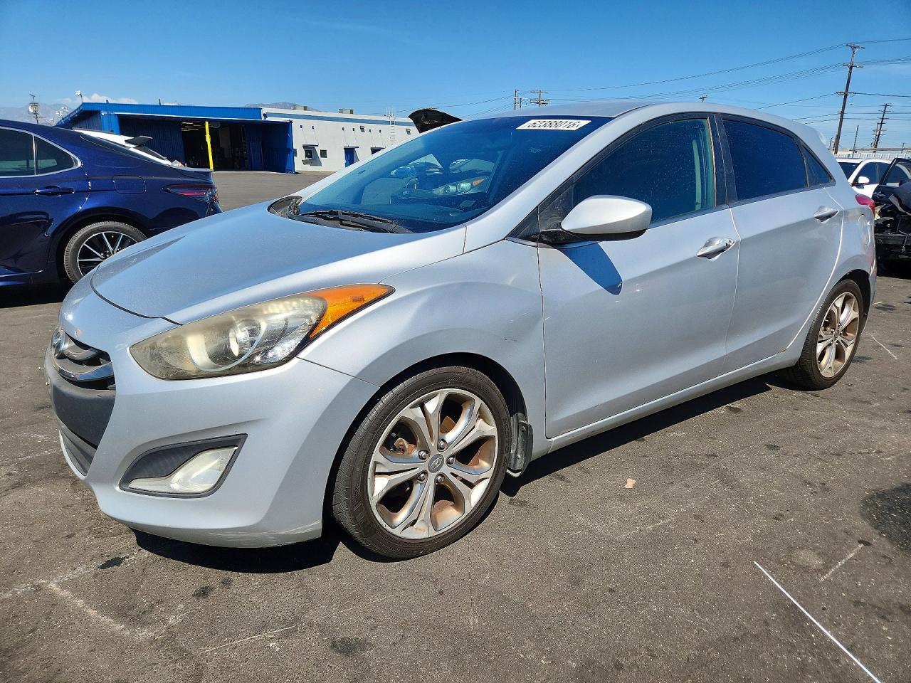 2013 Hyundai Elantra, VIN KMHD35LE0DU099555 — Minor dents and scratches