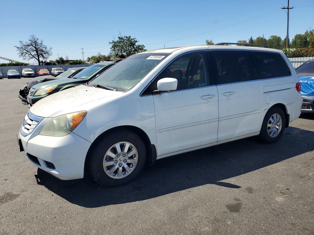 2009 Honda Odyssey EX-L, VIN 5FNRL38789B038933 — Minor dents and scratches